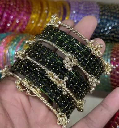 Elegant Black Beaded Gold Charm Bangle Set