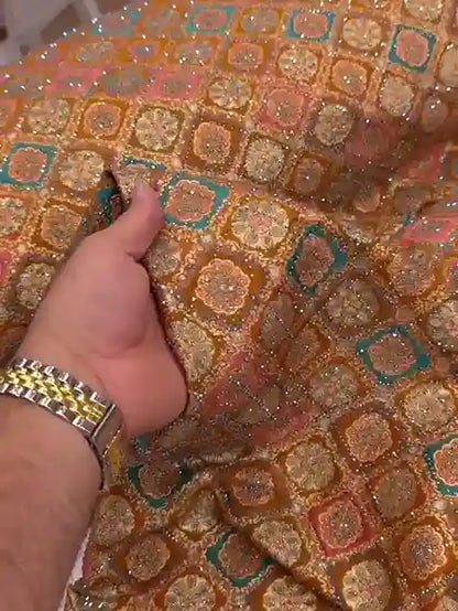 Embroidered fabric with zari and sequin work