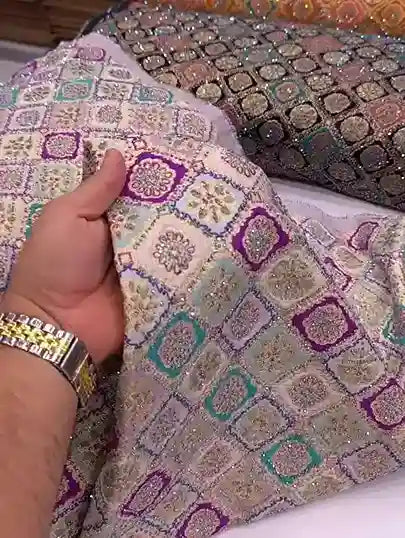 Embroidered fabric with zari and sequin work